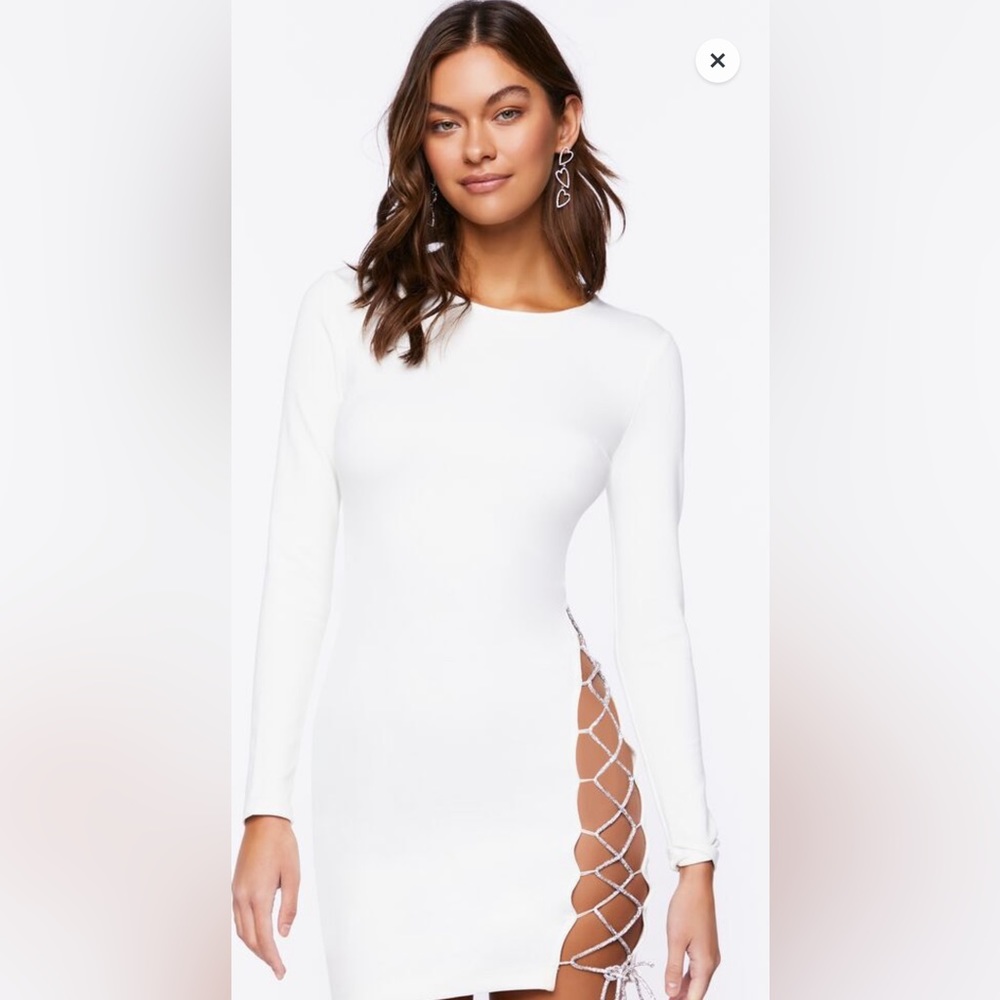 Black bodycon dress with cutouts - size SMALL. **this dress is black, NOT WHITE